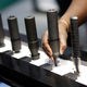 Silencers on display at a gun show in Las Vegas, NV. Image via AP Photo.